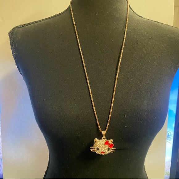 Betsey Johnson Jewelry - Betsey Johnson Gold Hello Kitty Pendant Necklace with Red Bow